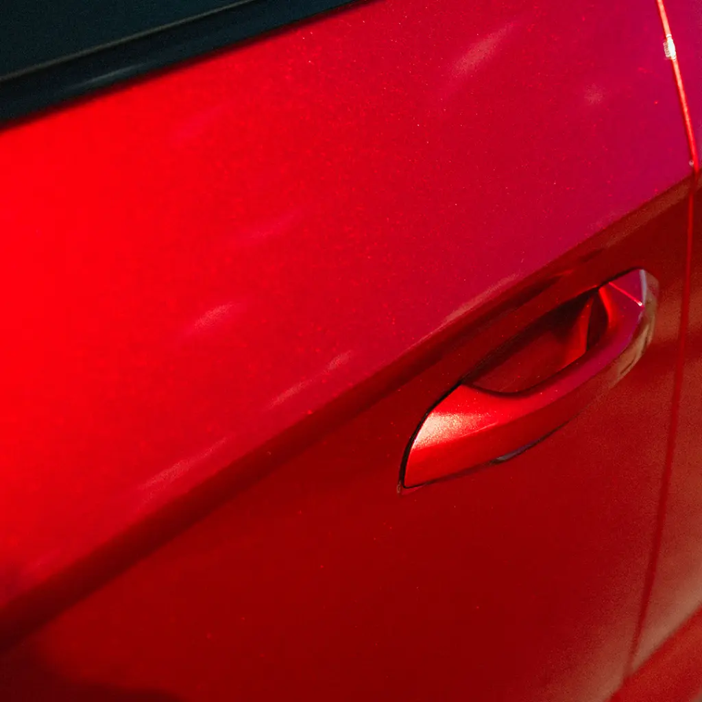 EVOLV-Super-candy-red-ppf-lamborghini-urus-closeup.webp